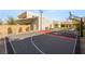 Modern home with a private basketball court, perfect for outdoor recreation and entertainment at 7385 Heron Canyon Ct, Las Vegas, NV 89117