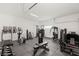 Spacious home gym equipped with professional-grade workout machines and free weights at 7385 Heron Canyon Ct, Las Vegas, NV 89117
