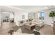 Spacious living room with contemporary furnishings and hardwood floors at 7385 Heron Canyon Ct, Las Vegas, NV 89117