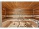 The sauna interior has wood paneling, multi-level benches, and temperature and humidity instruments at 7385 Heron Canyon Ct, Las Vegas, NV 89117