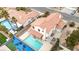 Aerial view showcasing a home with a private pool, patio, and landscaped backyard in a residential area at 7445 Shangri La Ave, Las Vegas, NV 89147