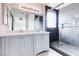 Bathroom features walk-in shower and double sink at 7445 Shangri La Ave, Las Vegas, NV 89147