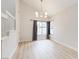 Bright living room with high ceilings, ample windows, and modern flooring at 7445 Shangri La Ave, Las Vegas, NV 89147