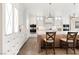 Gourmet kitchen featuring custom cabinets, stainless appliances, and an island with seating at 7569 Shadow Estates Way, Las Vegas, NV 89113