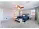 Bright main bedroom with a ceiling fan and natural light at 7761 Boyd Ave, Las Vegas, NV 89179