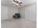 Bedroom features a ceiling fan, carpet, and closet space at 7761 Boyd Ave, Las Vegas, NV 89179