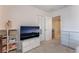Bedroom featuring neutral paint, plush carpet, and TV at 7761 Boyd Ave, Las Vegas, NV 89179