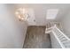 High-angle view of the foyer entrance with tile flooring and a staircase at 7761 Boyd Ave, Las Vegas, NV 89179