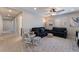 Comfortable living room with a ceiling fan and neutral decor at 7761 Boyd Ave, Las Vegas, NV 89179