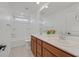 Bathroom boasts double sinks, quartz countertops, and tiled flooring at 8043 Texas Hills St, Las Vegas, NV 89113