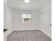 Clean, well-lit bedroom with a window and closet with sliding doors at 8043 Texas Hills St, Las Vegas, NV 89113