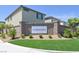 The Cordora community entrance sign is beautifully landscaped, with a grass lawn and lush plants at 8043 Texas Hills St, Las Vegas, NV 89113