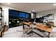 Modern home office with a large picture window offers incredible city views at 811 Magnum Cliff Ct, Henderson, NV 89012