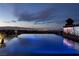 Luxurious infinity pool offers breathtaking city views, providing a serene escape with ultimate relaxation and style at 811 Magnum Cliff Ct, Henderson, NV 89012