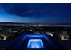 Relaxing spa with breathtaking city views at night, providing the perfect retreat for unwinding and rejuvenation at 811 Magnum Cliff Ct, Henderson, NV 89012