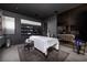 Relaxing spa room with massage table, open shelving, and elegant decor offers a peaceful retreat at 811 Magnum Cliff Ct, Henderson, NV 89012