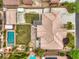Overhead aerial perspective showing the property layout, swimming pool, landscaping, and roof design at 8216 Tursi Lodge Ct, Las Vegas, NV 89131