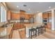 Well-equipped kitchen with granite counters, stainless appliances, and ample cabinet space at 8216 Tursi Lodge Ct, Las Vegas, NV 89131