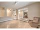Spacious living room featuring recessed lighting, tile floors, and an open floor plan at 8216 Tursi Lodge Ct, Las Vegas, NV 89131