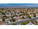 Wide aerial shot of the community with well-maintained homes and desert landscaping at 8216 W Hammer Ln, Las Vegas, NV 89149