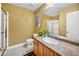 Bright bathroom featuring tile flooring, granite counters, and a glass door shower at 8216 W Hammer Ln, Las Vegas, NV 89149