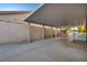 Spacious covered carport with ample parking and storage shed in the rear for convenience at 8216 W Hammer Ln, Las Vegas, NV 89149