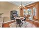 Dining room with a fireplace, breakfast nook and natural light at 8216 W Hammer Ln, Las Vegas, NV 89149