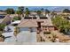 Charming home featuring tile roof, desert landscaping, three car garage and mountain views at 8216 W Hammer Ln, Las Vegas, NV 89149