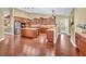 Spacious kitchen with hardwood flooring, large island and stainless steel appliances at 8216 W Hammer Ln, Las Vegas, NV 89149