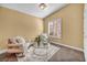 Living room with carpet, neutral paint, and natural light at 8216 W Hammer Ln, Las Vegas, NV 89149