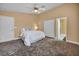 Comfortable main bedroom featuring a ceiling fan and ensuite access at 8216 W Hammer Ln, Las Vegas, NV 89149