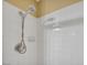 Close-up of a shower featuring a modern shower head and bright tile at 8216 W Hammer Ln, Las Vegas, NV 89149