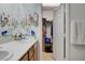 This bathroom boasts a double sink vanity and a separate walk-in closet for storage at 8783 Halcon Ave, Las Vegas, NV 89148