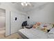 Bedroom with carpet, ceiling fan, closet, and a full bed with pillows at 8783 Halcon Ave, Las Vegas, NV 89148
