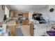 Functional kitchen with stainless steel appliances and granite countertops at 8783 Halcon Ave, Las Vegas, NV 89148