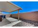 Covered patio with concrete flooring and a view of the backyard at 8783 Halcon Ave, Las Vegas, NV 89148