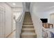 View of the carpeted staircase at 8783 Halcon Ave, Las Vegas, NV 89148