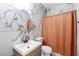Modern bathroom featuring marble tile, updated fixtures, and a stylish vanity for a clean, contemporary look at 916 Bob Barney Ave, North Las Vegas, NV 89086