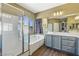 Bathroom with separate tub and shower, modern vanity, and stylish finishes, offering a spa-like experience at 916 Bob Barney Ave, North Las Vegas, NV 89086
