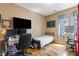 Bedroom featuring a desk setup with dual monitors, offering a dedicated workspace for productivity at 916 Bob Barney Ave, North Las Vegas, NV 89086