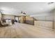 Spacious bonus room with ample seating, a ceiling fan, and plenty of open area for recreation at 916 Bob Barney Ave, North Las Vegas, NV 89086