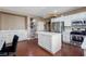 Modern kitchen with white cabinets, quartz countertops, and stainless-steel appliances at 916 Bob Barney Ave, North Las Vegas, NV 89086