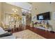 Spacious living room with high ceilings, hardwood floors, and staircase at 916 Bob Barney Ave, North Las Vegas, NV 89086