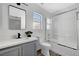 Clean bathroom with modern vanity, sink, and tub/shower combo at 9526 Summer Furnace St, Las Vegas, NV 89178