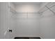Walk in closet with wire rack shelving and wood-look flooring at 9526 Summer Furnace St, Las Vegas, NV 89178
