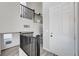 Bright entryway featuring soaring ceilings, open staircase with wooden railings, and new flooring at 9526 Summer Furnace St, Las Vegas, NV 89178