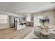 Bright kitchen features stainless steel appliances, gray cabinets, and breakfast bar at 9526 Summer Furnace St, Las Vegas, NV 89178