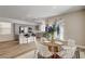Bright kitchen boasts stainless steel appliances, gray cabinets, and breakfast bar seating at 9526 Summer Furnace St, Las Vegas, NV 89178
