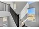Hallway stairs with decorative railing at 9526 Summer Furnace St, Las Vegas, NV 89178