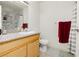 Bathroom with granite counters, wooden cabinets and a neutral color palette at 408 N Torrey Pines Dr, Las Vegas, NV 89107